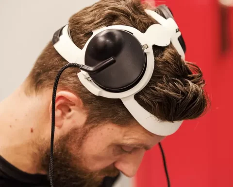Sensors on Gert-Jan's head transmit his brain signals from an implant to a computer